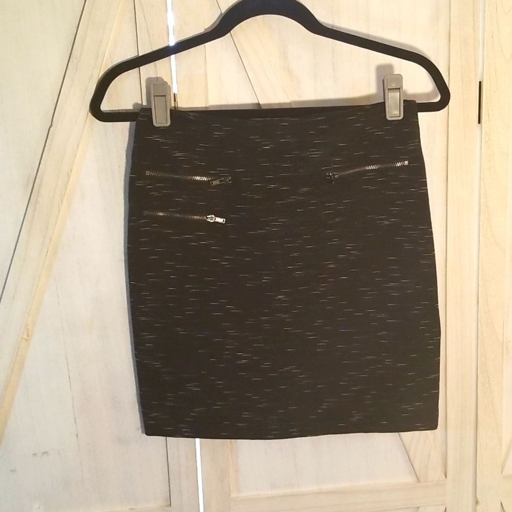 Banana republic black skirt with zipper detail on front.
